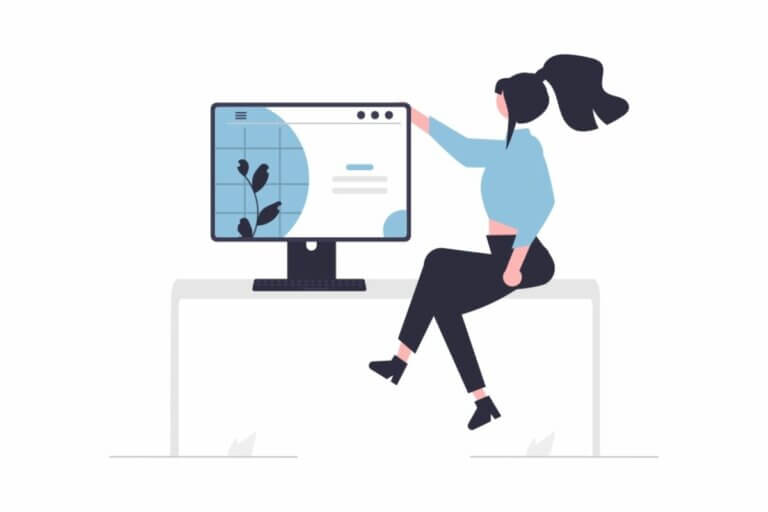Illustration of woman on desk next to computer monitory