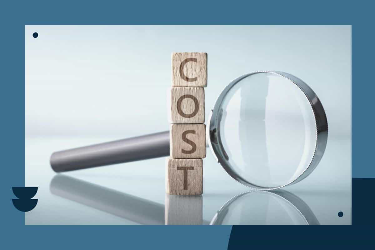 Magnifying glass with block saying cost